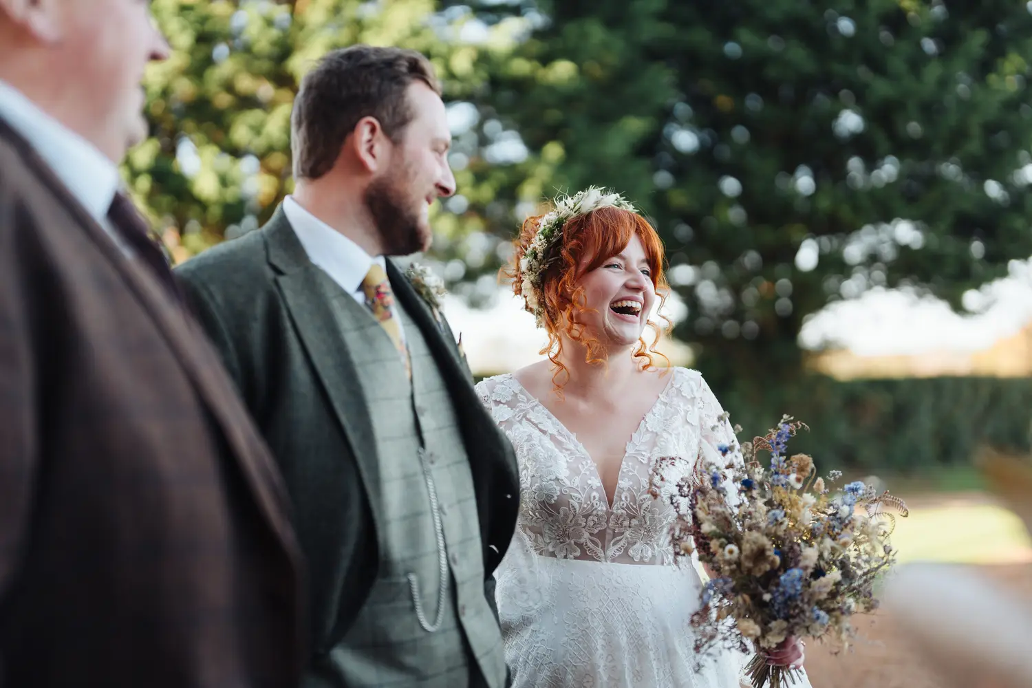 Sam gazing lovingly at Megan during their wedding portraits at Pentney Abbey Norfolk