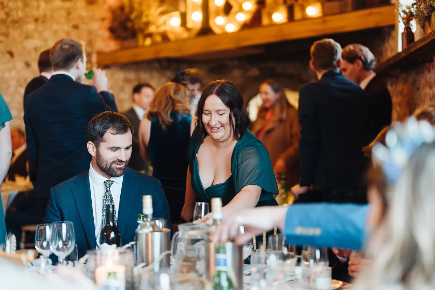 Megan and Sam making their grand entrance into the reception to cheers from all their guests