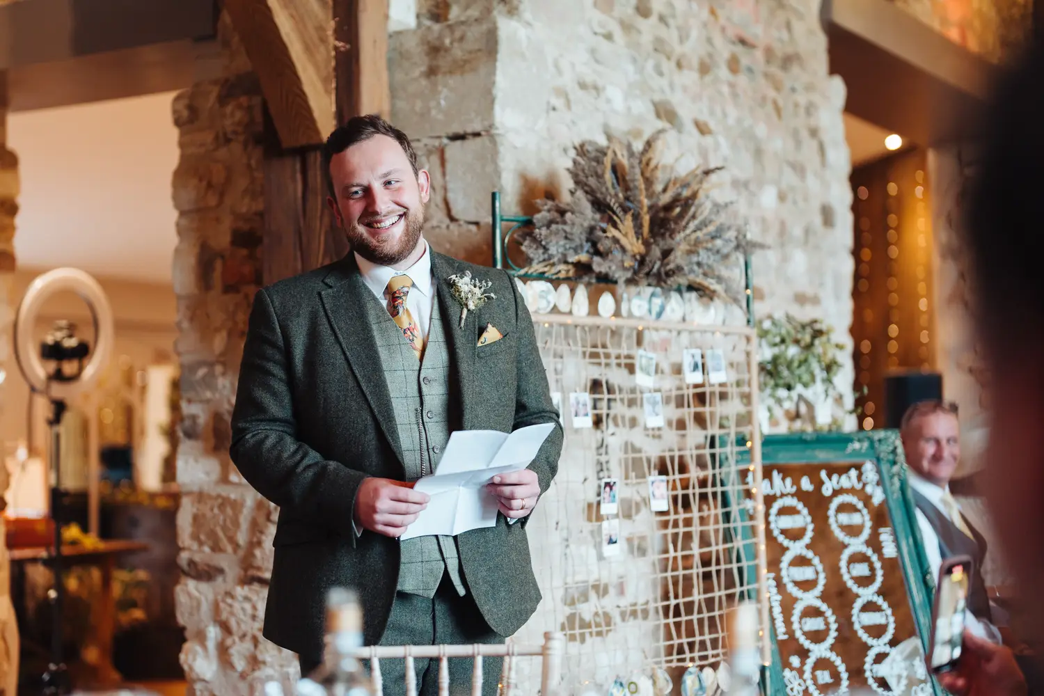 Joyful candid shot of guests at Megan and Sam's Pentney Abbey wedding celebration in Norfolk