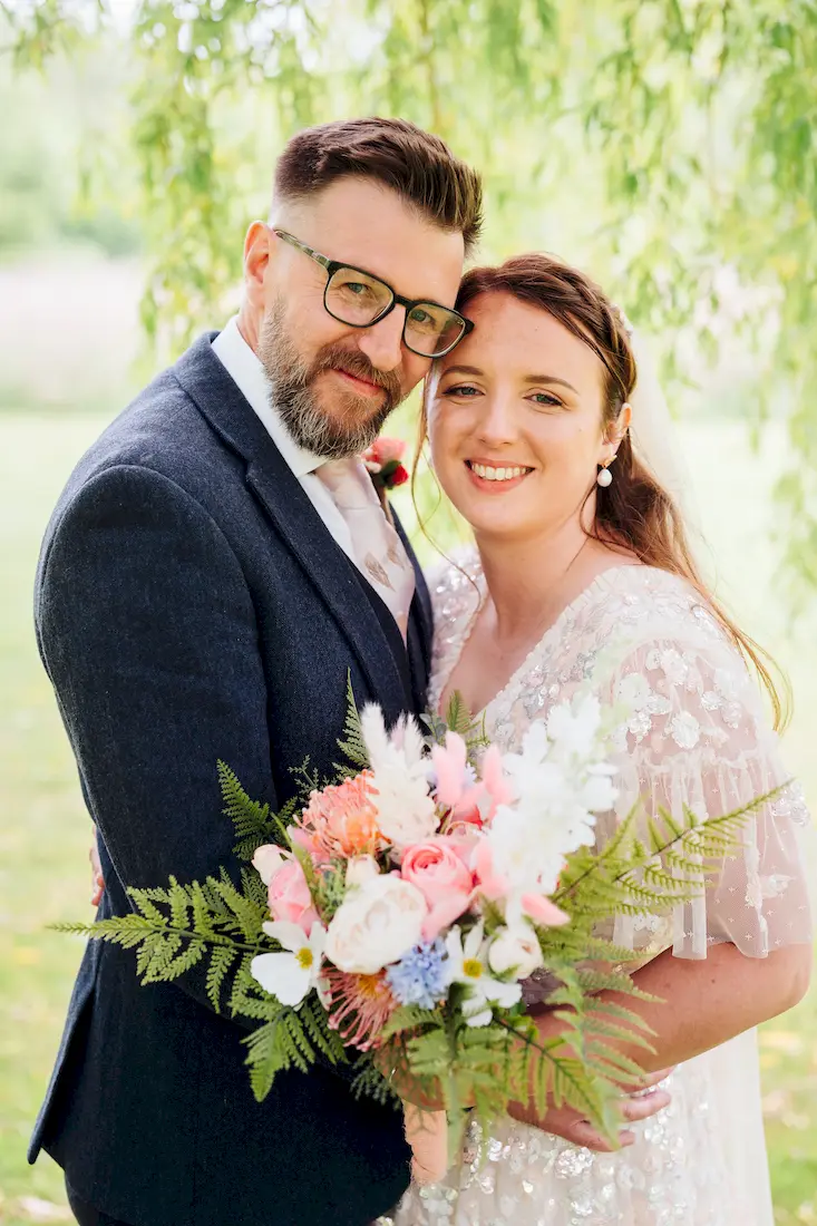 Intimate wedding portrait in the grounds of Norfolk Mead Hotel Coltishall