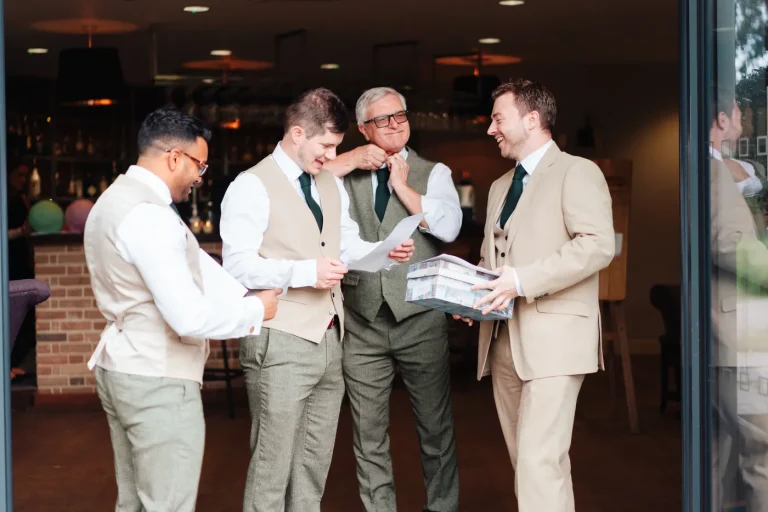 Wedding officiant speaking during ceremony in the Garden Room at Norfolk Mead Hotel