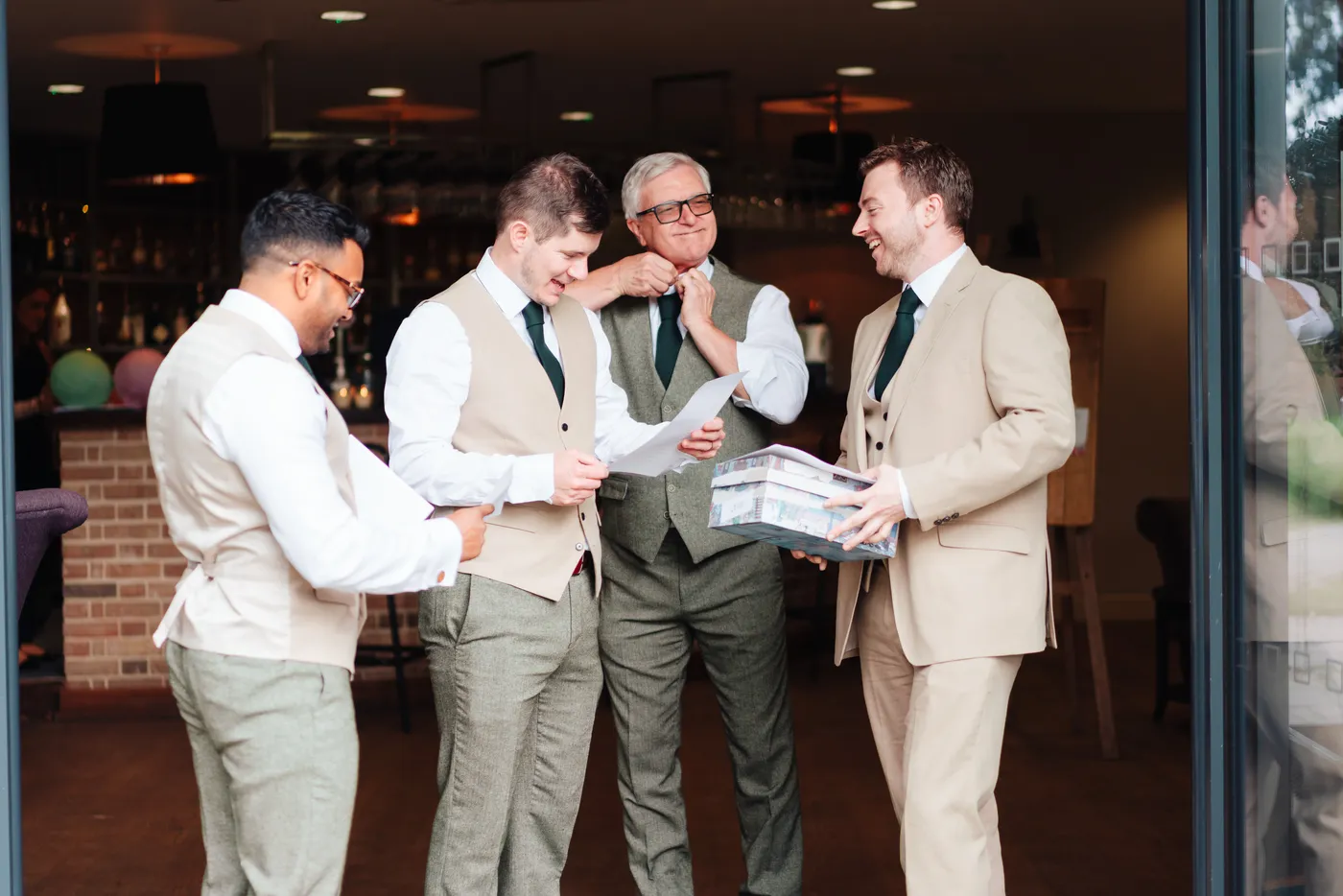 Wedding officiant speaking during ceremony in the Garden Room at Norfolk Mead Hotel