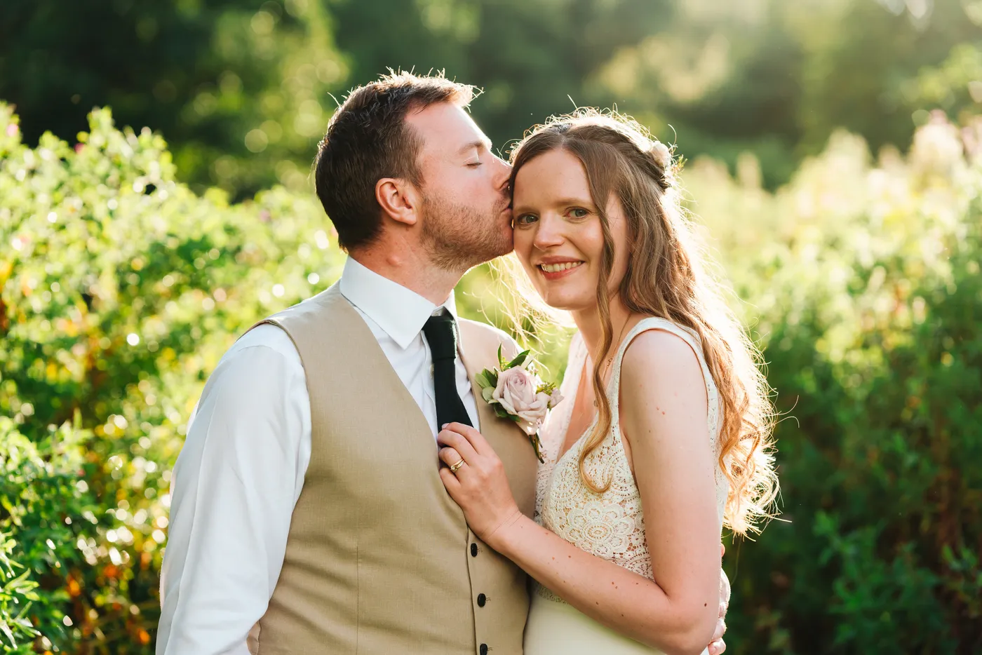 Bride and groom listening to speeches at The Norfolk Mead Hotel summer wedding
