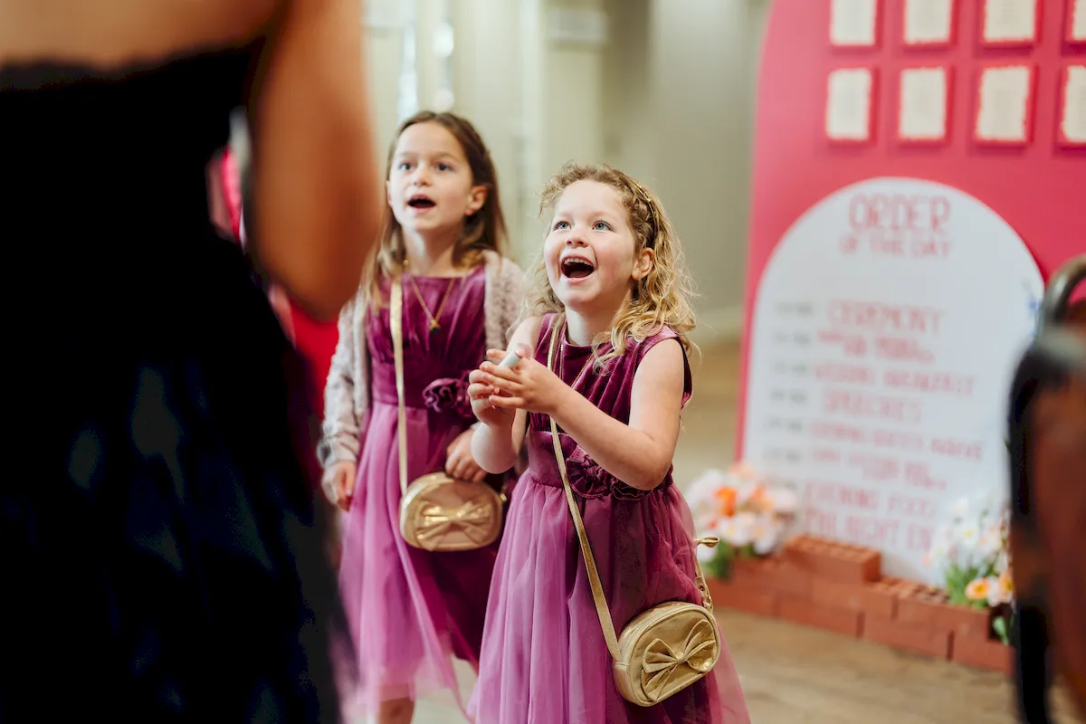 Annalie with bridesmaids laughing before the ceremony at Norfolk Mead Hotel Norfolk