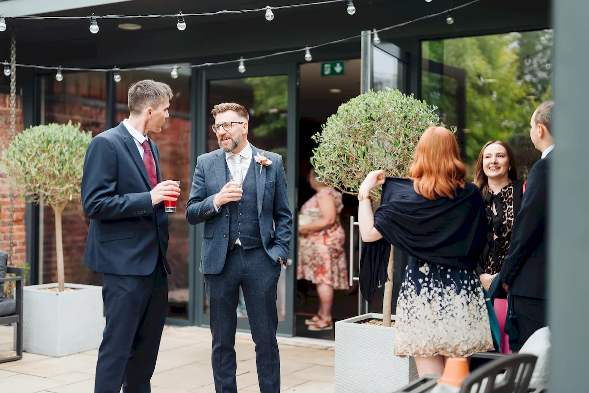 Annalie and Matt exchanging vows at The Norfolk Mead Hotel Coltishall Norfolk