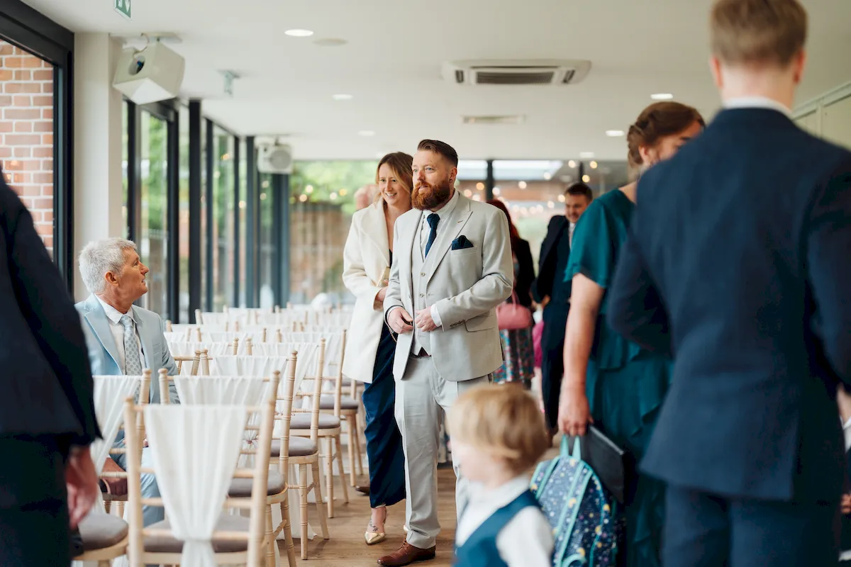 Wedding ring exchange at The Norfolk Mead Hotel Garden Room Coltishall Norfolk