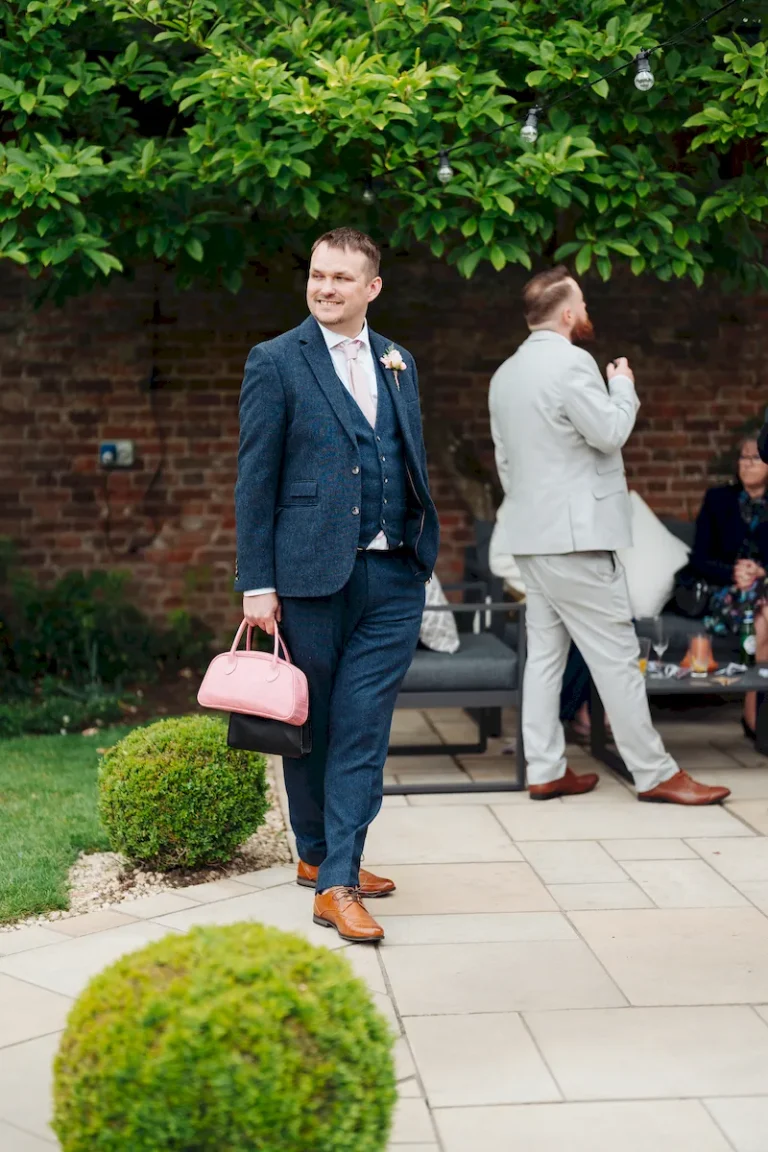 Candid group shot of wedding guests at The Norfolk Mead Hotel Coltishall Norfolk
