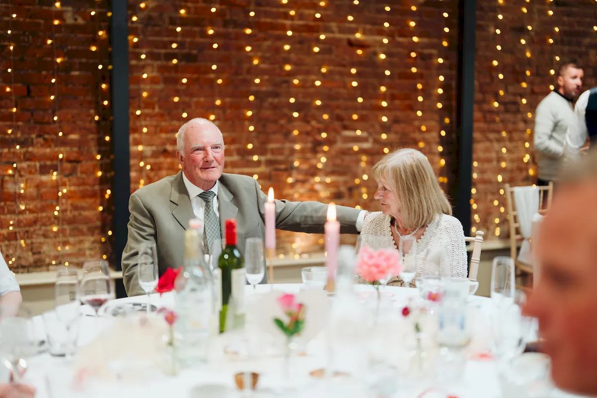 Guests laughing during wedding speeches at The Norfolk Mead Hotel Coltishall