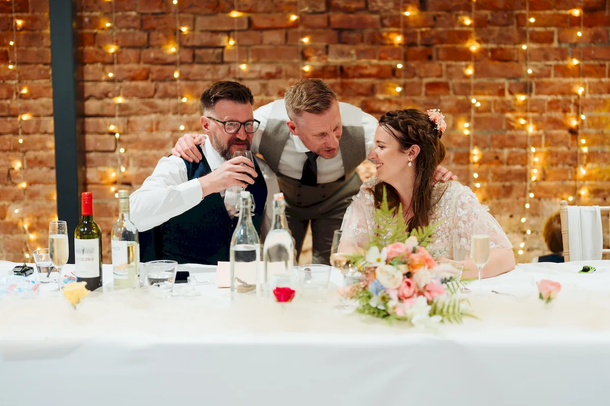 Annalie and Matt listening to speeches at The Norfolk Mead Hotel Coltishall Norfolk