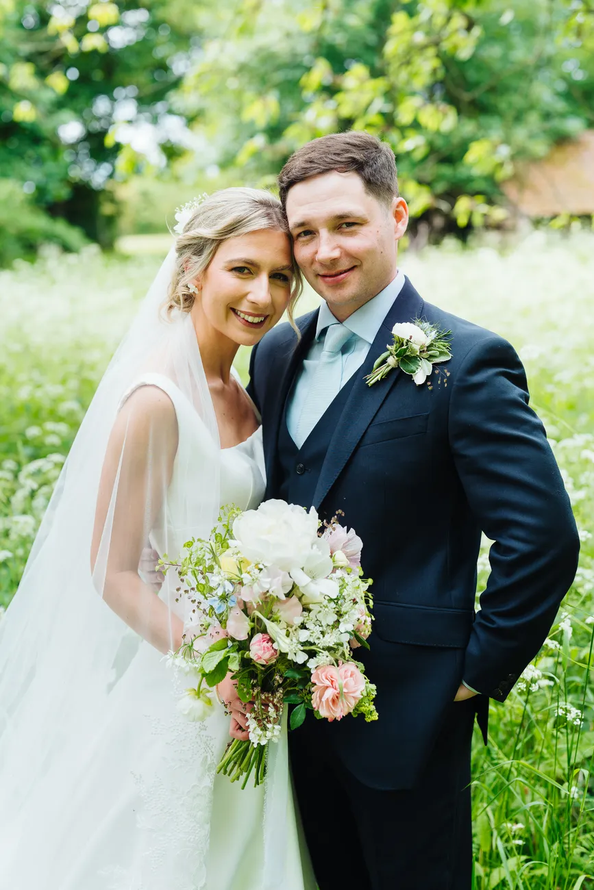Candid moment during the wedding breakfast at Preston Priory Barn Suffolk