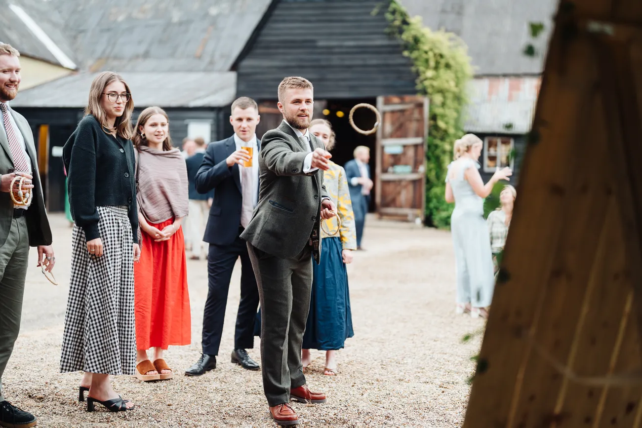 Lucy and George in the courtyard at Preston Priory Barn Suffolk during golden hour