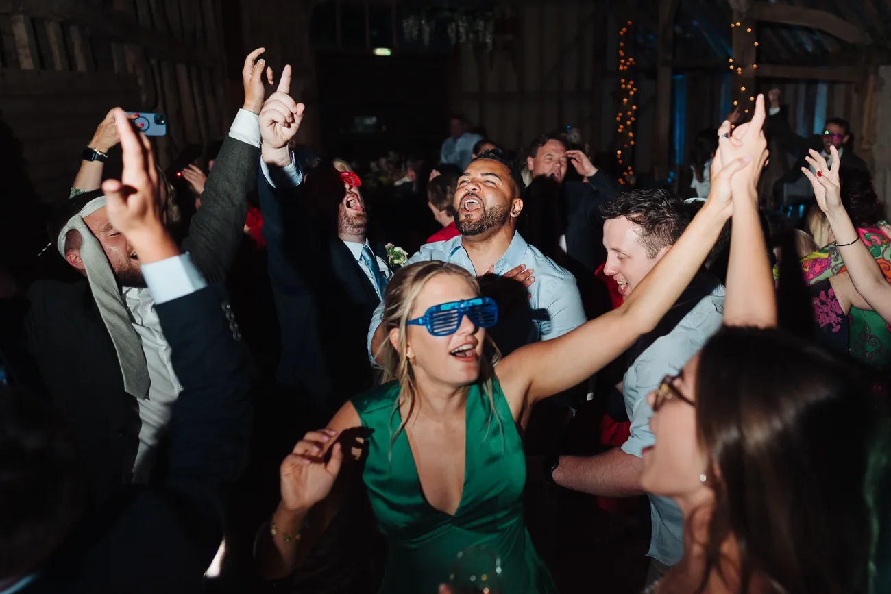 Guests enjoying the last dance at Preston Priory Barn Suffolk wedding